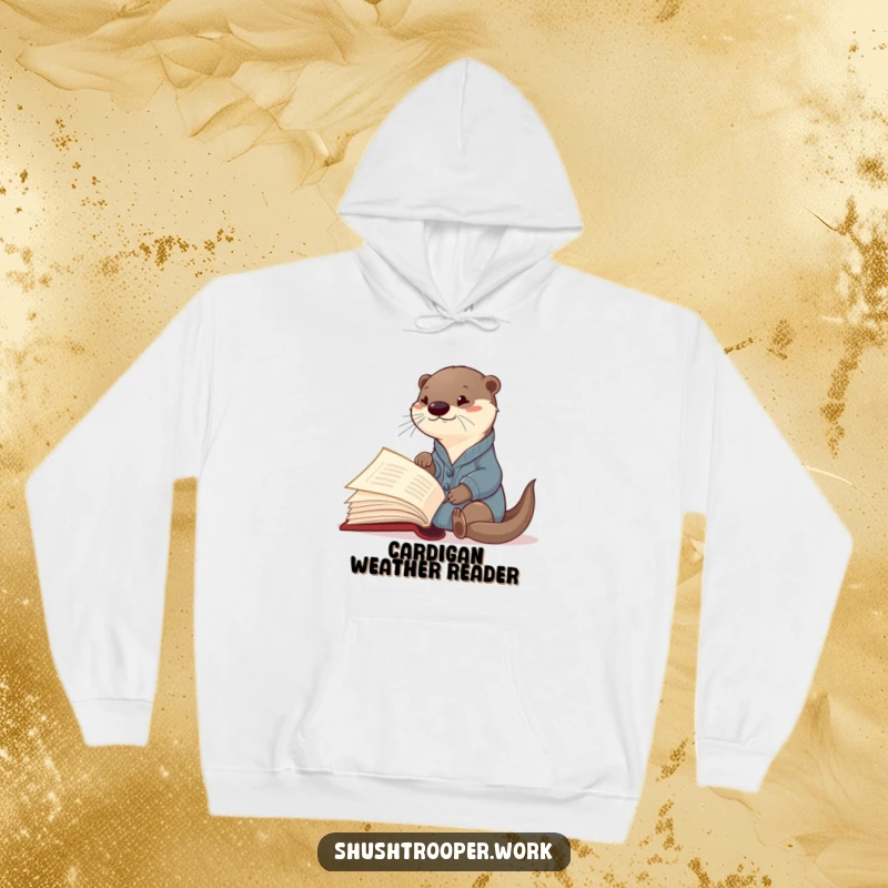 Funny Otter Librarian Hoodie: A curious otter in a cardigan eagerly points at a giant book, offering warmth and intellect.