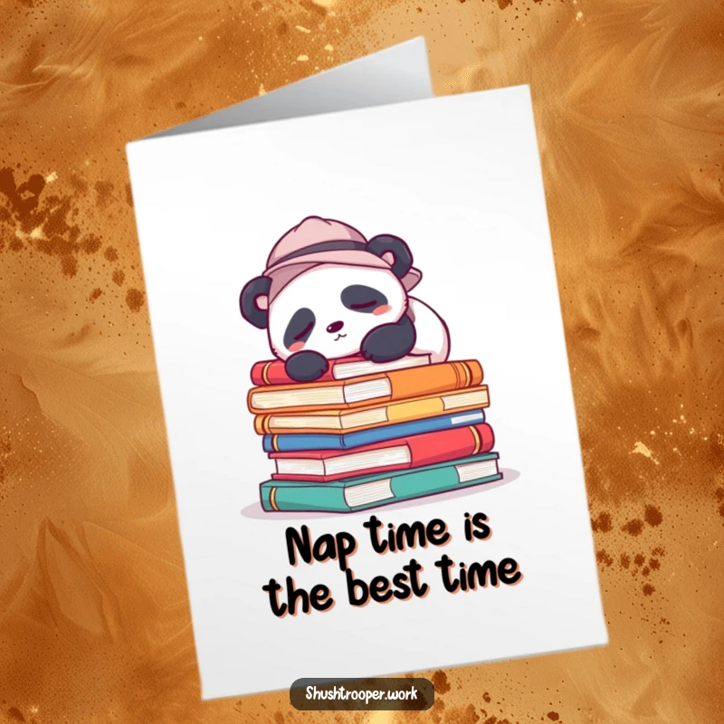Cute free printable birthday card: a sleepy panda in a hat naps on a large stack of colorful books.