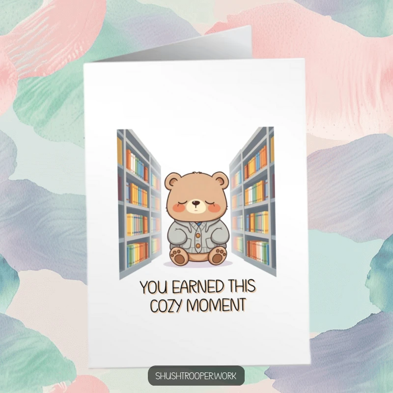 Funny Free Printable Congratulations Card: A bear in a cardigan dozes contentedly in a library, wishing congrats.